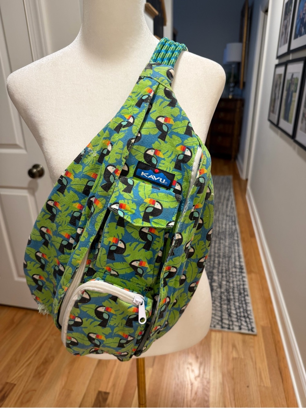 Kavu Green Toucan Pattern Sling Bag with Black and White Accents